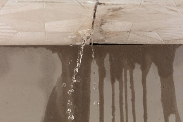 Professional Flood Damage Cleanup technician working in Charleroi, PA